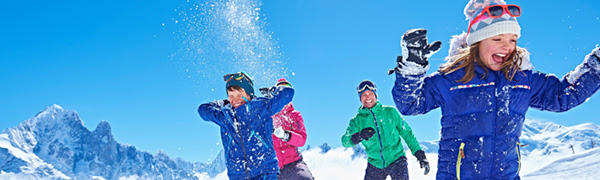 Family having snowball fight, Chamonix, France